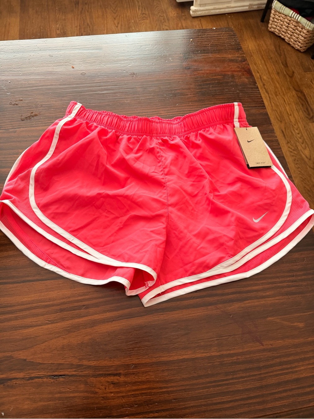 New with tags Nike Women's size large Coral Athletic Shorts with White Trim